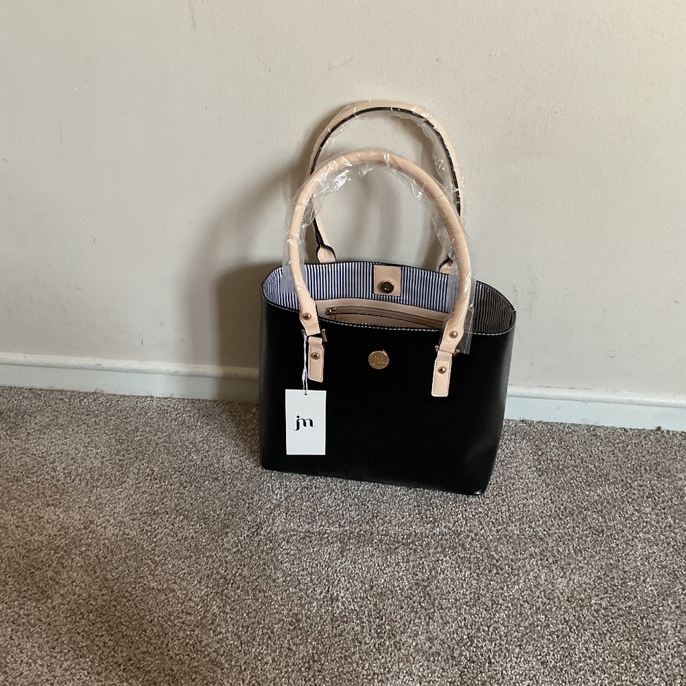Four piece Jessica Moore purse set